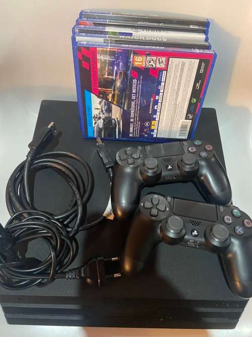 SONY PLASTATION 4 PRO*CUH-7015B*1TB HDD*5 GAMES*2 CONTROLLERS*HDMI,POWER and USB CABLES